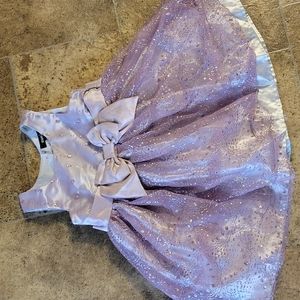 Is purple sparkly dress